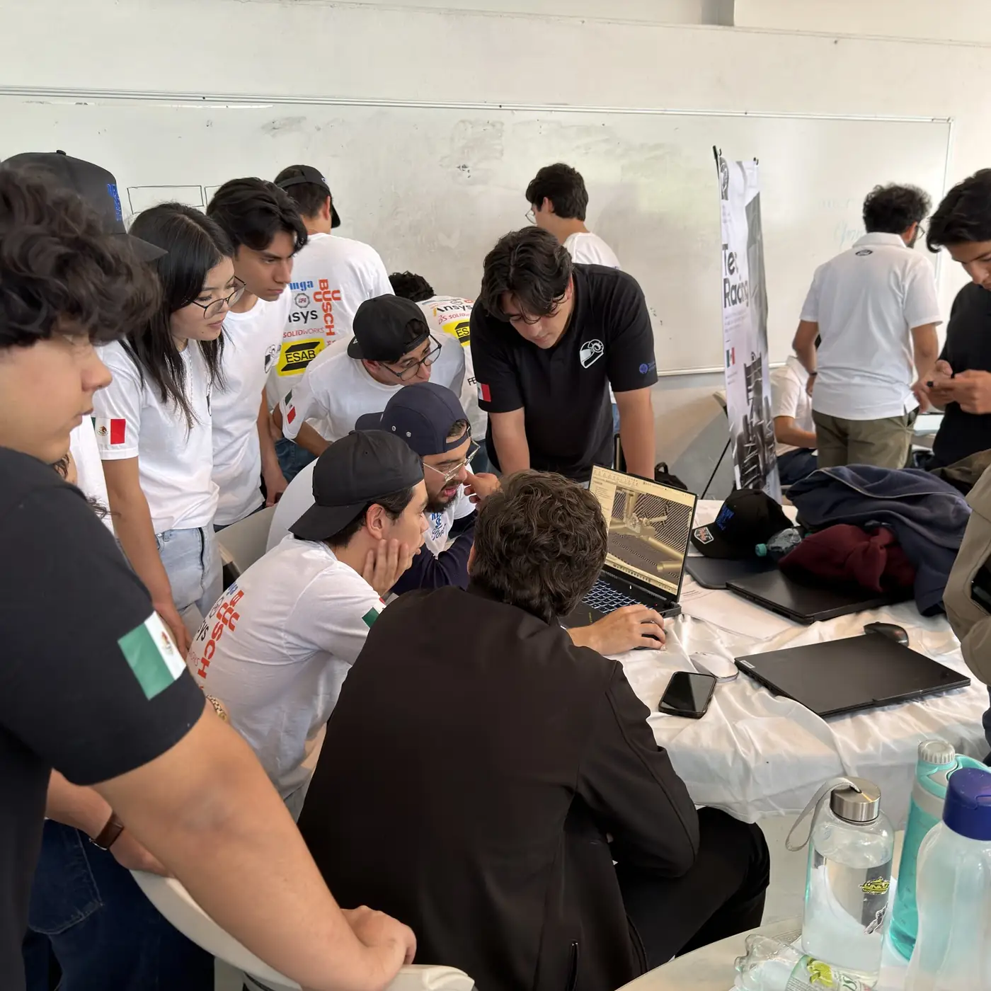 TEC Racing members defending the design of the car in front of a judge